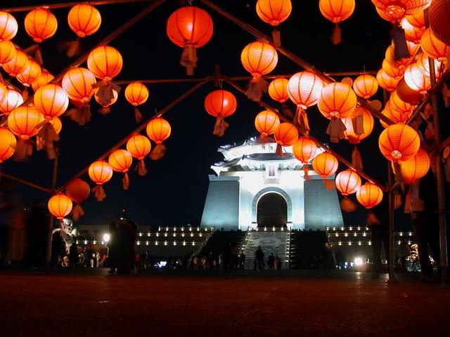The sky is lit with lanterns and fireworks during Teng Chieh